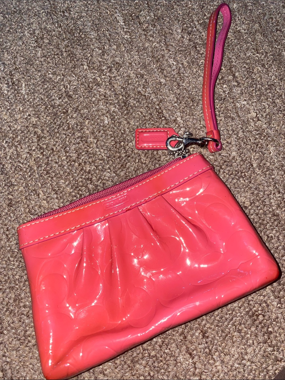 Coach Pink Patent Wristlet with Logo Embossing